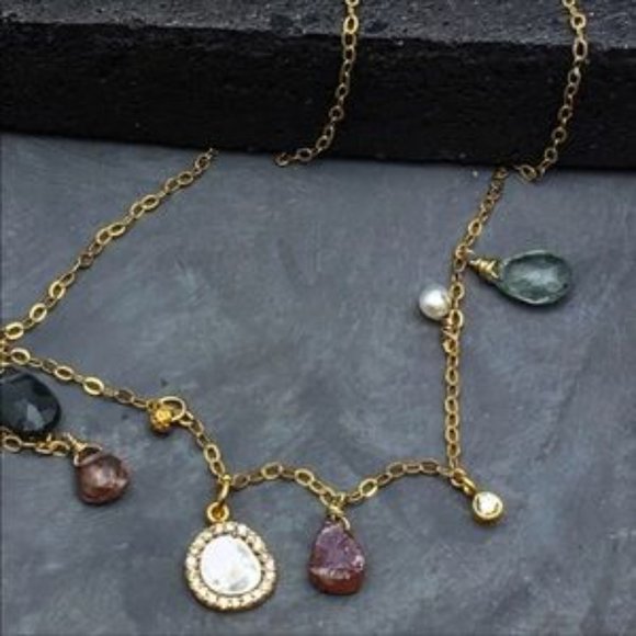Diamonds gold and gemstone necklace